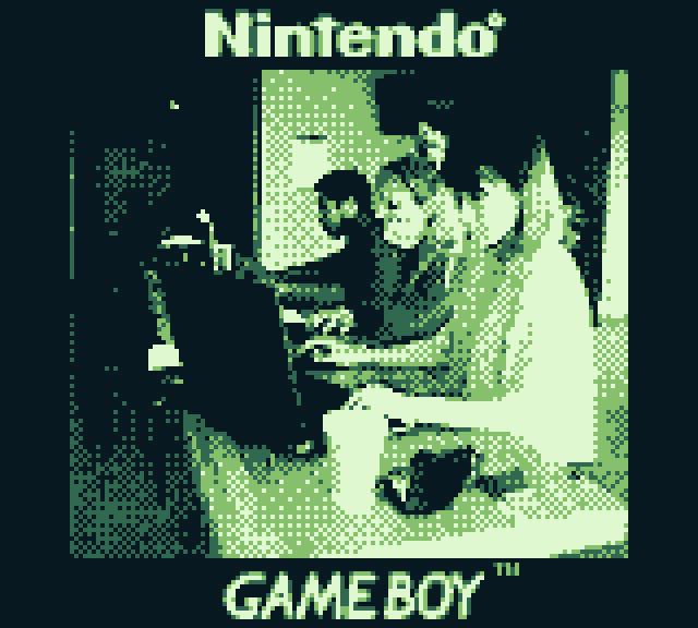 a game boy camera photograph, showing three people sitting at a bench working on laptops